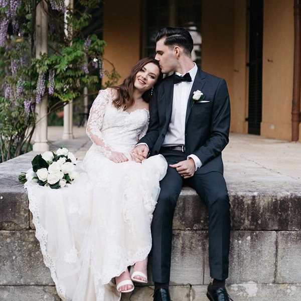 Couple sitting on the veranda at Vaucluse House